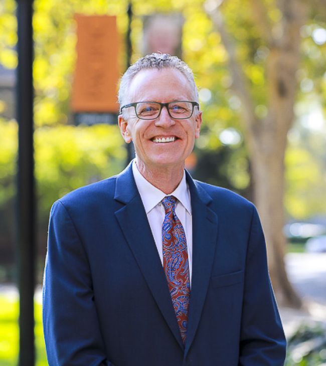 McGeorge School of Law Dean Michael Hunter Schwartz on the quad of the Sacramento campus