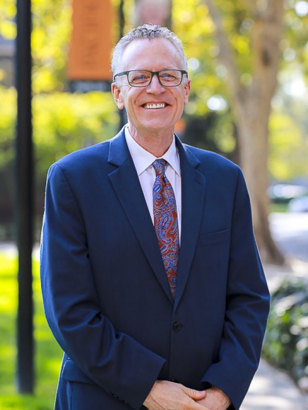 McGeorge School of Law Dean Michael Hunter Schwartz on the quad of the Sacramento campus