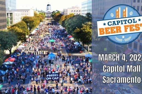 Crowded street with text that says "Capitol Beerfest March 4, 2023 Capitol Mall Sacramento"