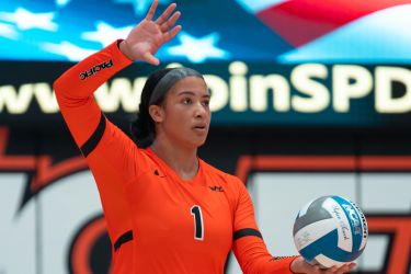 Alexa Edwards serves