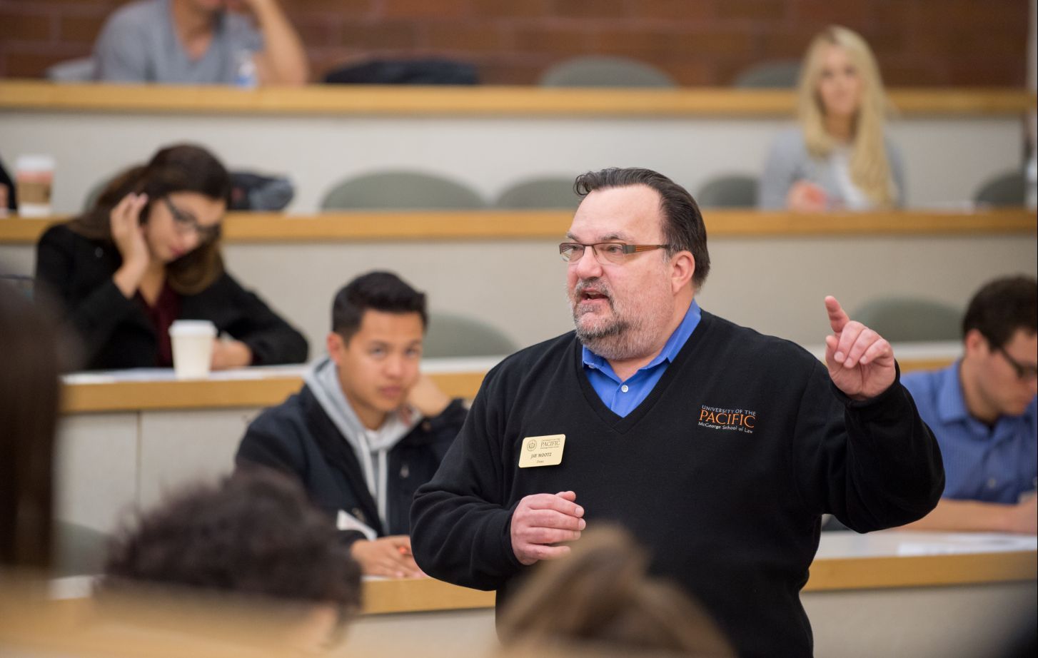 Professor Francis J. Mootz III speaks to a classroom of students while making a hand gesture.