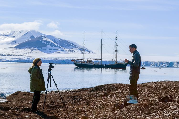 Dr. Teresa Bergman interviewing an artist in Svalbard, Norway