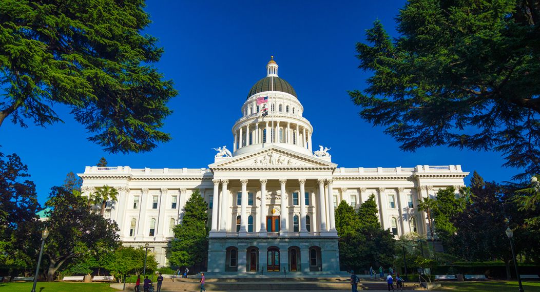 California State Capitol building, wide angle with trees stock photo